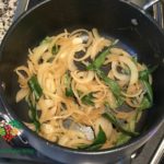 Curry Leaves and Onions in Saucepan